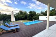  Flic en Flac, Mauritius: For sale, magnificent recent contemporary villa with swimming pool and nature views.