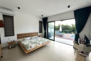  Flic en Flac, Mauritius: For sale, magnificent recent contemporary villa with swimming pool and nature views.