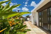4-bedroom villa with pool. Live in luxury and comfort near the Croisette shopping center in Grand Baie, in the private Bois Chandelle residential area.