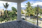 Flic en Flac &ndash; For Rent: Pleasant and recently built 2-bedroom apartment located on the second and top floor (no elevator), in a quiet area, just 200 metres from the beach.