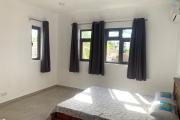 Flic en Flac &ndash; For Rent: Pleasant and recently built 2-bedroom apartment located on the second and top floor (no elevator), in a quiet area, just 200 metres from the beach.