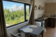 Studio rooftop avec vue panoramique sur le lagon – Calodyne
